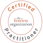 the Fearless Organization Scan Badge - Orange and Grey text on a white background